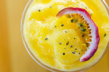 Passion fruit smoothie sliced in glass.