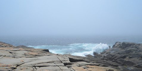 Summer in Nova Scotia: Waves Crash at Peggy's Cove as the Fog Closes In