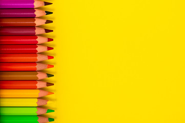 color pencil with yellow paper background