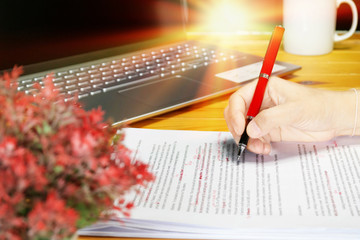 proofreading paper on table