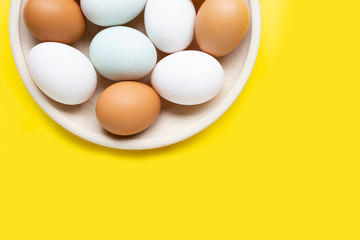 Eggs on yellow background.