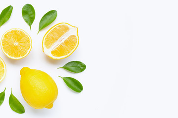 Lemon and slices with leaves isolated on white.