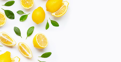 Fresh lemon and  slices  with leaves isolated on white.