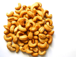 Cashew nuts placed on a white background