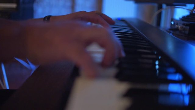 CLOSEUP Hands of a musician playing a piano