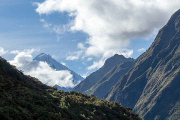Obraz na płótnie Canvas Green mountains with snow covered peaks, Andes, Peru