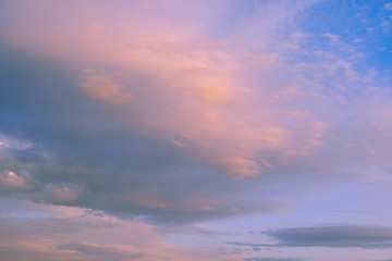 Naklejka na ściany i meble Beautiful sky with clouds at sunset - full frame image of sky