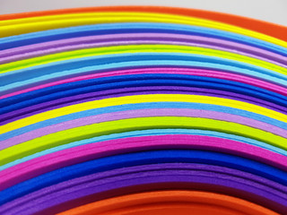 Obraz premium Colorful bright spectrum papers as an abstract background. Flat lay with geometric shapes.