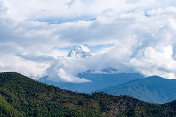 Obraz na płótnie Canvas One of Himalaya's massive see through the cloud
