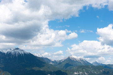 Fototapeta na wymiar Sunny landscape view of Julian Alps from Bled lake, Slovenia, Europe.