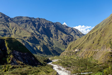 Fototapeta na wymiar The Santa Teresa River in green lush valley. Hiking trail to Machu Picchu, Peru