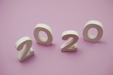 2020 happy new year with space copy on purple background