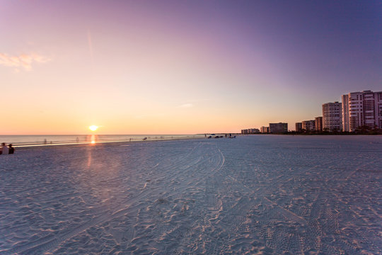 Marco Island Famous Beach And Calmed Ocean During Sunset, Florida, USA. Amazing Cloudscape After A Big Tropical Storm In The Gulf Of Mexico, Close To Everglades National Park 