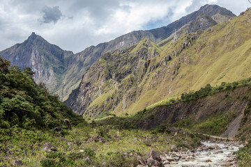 The Santa Teresa River in green lush valley. Hiking trail to Machu Picchu, Peru