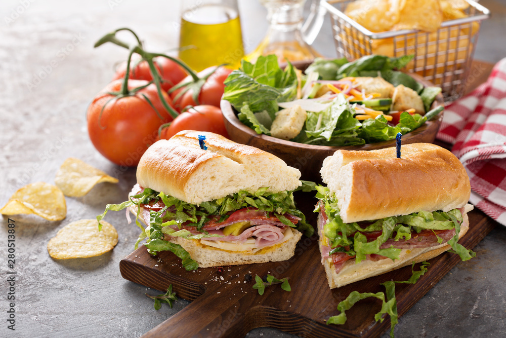 Sticker italian meat sandwich with salad and chips for lunch