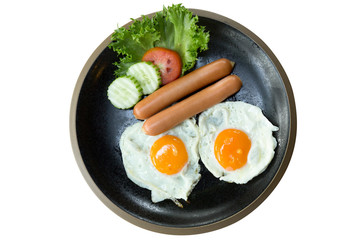 Fried eggs and sausages plate isolated on background