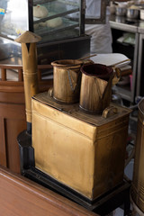 Vintage thai coffee boiler pot with hot vapor in coffee shop