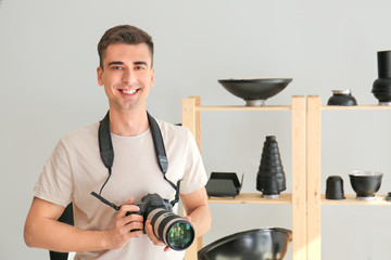 Male photographer in modern studio