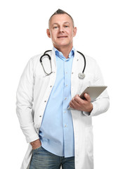 Handsome middle-aged doctor with tablet PC on white background