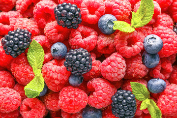 Many sweet ripe berries as background