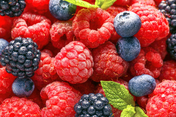 Many sweet ripe berries as background