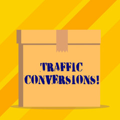 Writing note showing Traffic Conversions. Business concept for visitor who has been converted into a client or customer