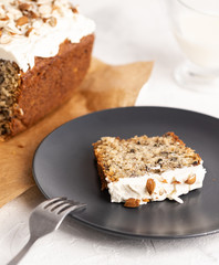 Piece of  brown cake with nuts