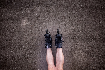 man with inline skates skating on the street