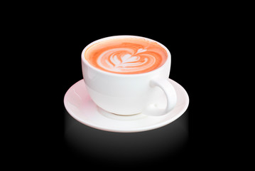 Coffee cup latte art (heart) in cafe on black background