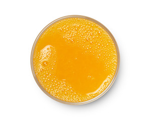 glass of fresh orange juice isolated on white background, top view