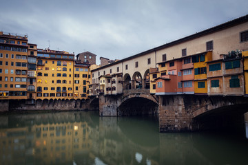 Early winter morning in Florence. Rain In The Old Town. Deserted Ponto Vecchio. Medieval city. Ponte Vecchio in Florence