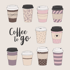 Coffee cup set. Vector collection with various disposable cups of coffee to go. Hand drawn doodle illustration