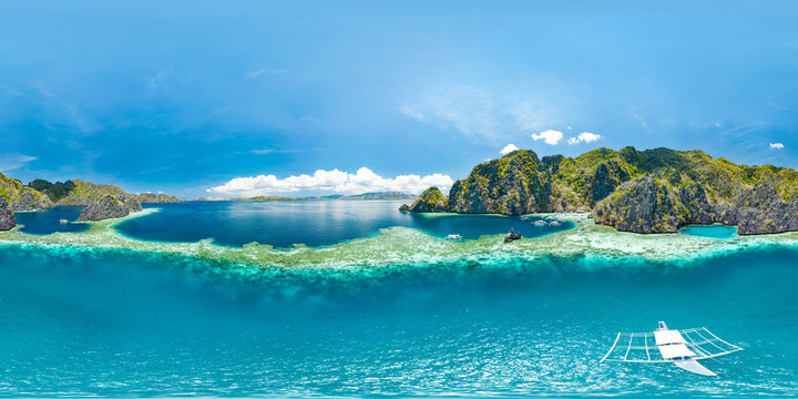 Epic aerial spherical panorama of blue lagoons and limestone cliffs of Coron, Palawan, Philippines. Full 360 panorama.