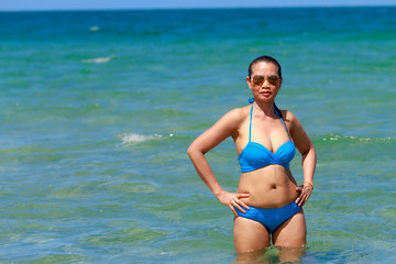 Obraz premium Woman show bikini blue beautiful at beach Ban Krut