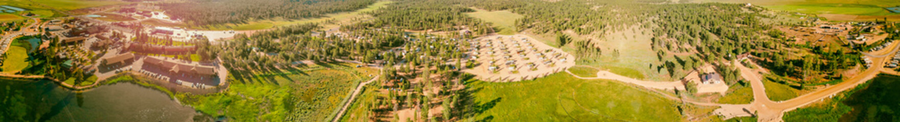 Obraz premium Bryce Canyon City, entry point of National Park. Panoramic aerial view on a sunny day