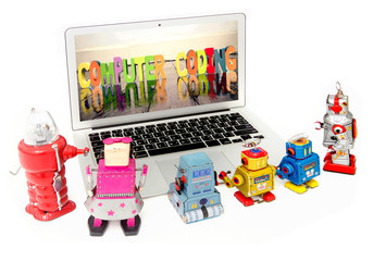 kid robots learn code on a laptop computer