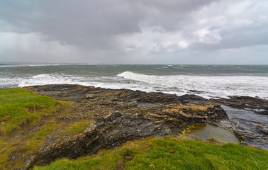 A large Atlantic Storm moves over Slade and County Wexford, with High Winds and a large Running Swell coming in from the West.