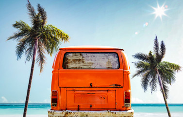 Orange summer car on beach and free space for your decoration. 