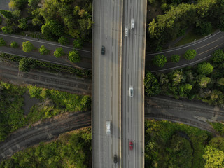 Photo of a road junction with cars and landscape top view, texture for design
