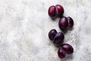 Ugly plums. Abnormal organic fruit