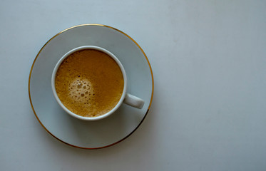 A Cup of morning invigorating coffee for a better mood in the morning.