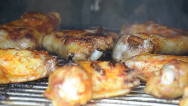 Barbecue Chicken Cooking On Grill