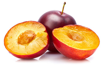 Fresh plum in cut. Fruity still life. Healthy food. Isolated on white background.