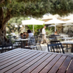 Table background  in a outdoor restaurant view. Empty  space for your decoration and advertising products.