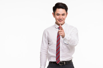 Asian businessman standing and point his finger..