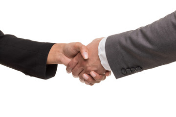 Businessmen hands shake together..