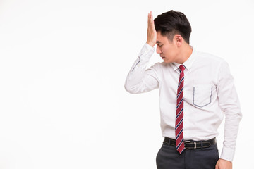 Asian businessman standing and puts hand on head..