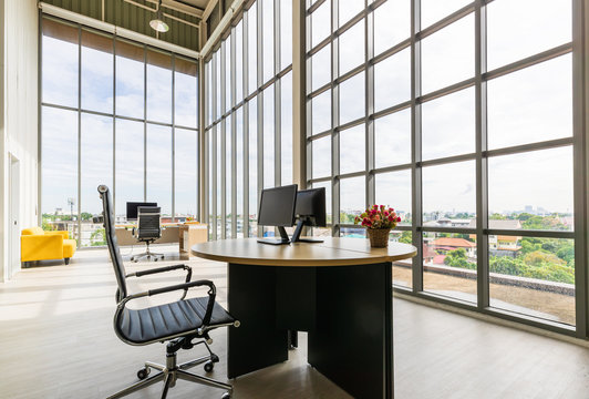 A wide-angle image of a modern office..