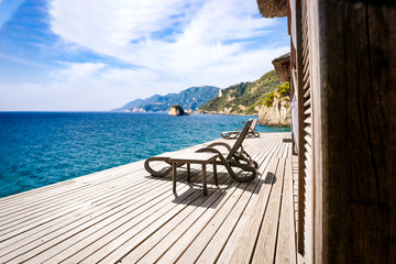 Glamping holidays. A beautiful view of island, sea, mountains and blue sky in distance. 
