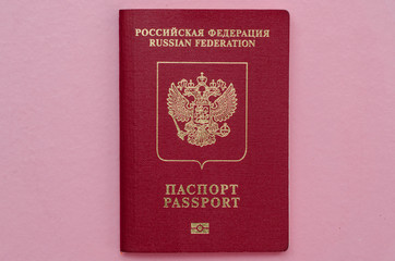 russian passport on a pink background